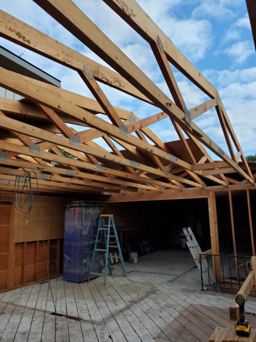 Construction photo of North Beach roof framing removed over the main floor