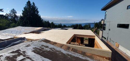 Construction photo of new sheathing over the North Beach main floor with water views