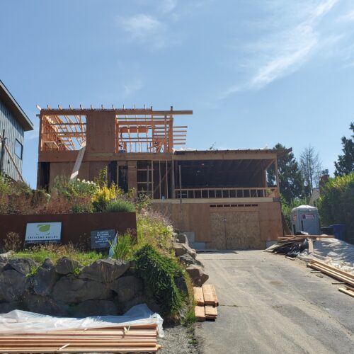 Construction photo of the North Beach home from the street with the second story framed