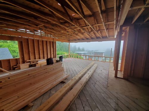 Construction photo of the North Beach upper level framing with views toward Puget Sound
