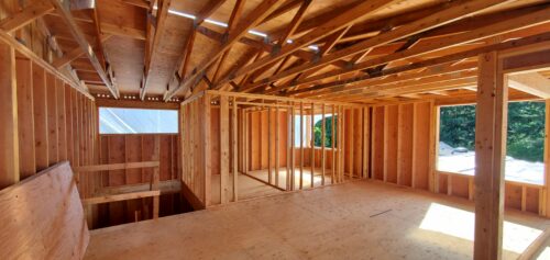 Construction photo of the framed North Beach second-story primary suite