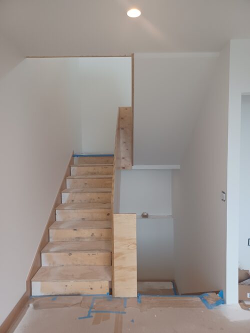 Construction photo of the new North Beach stairwell with raw treads before finishing